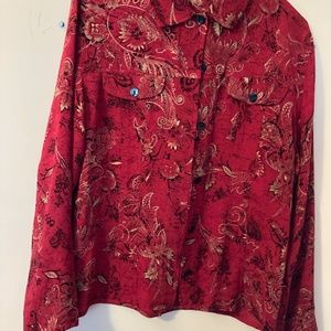 Chico's blouse, size 8. Red with black and tan designs.